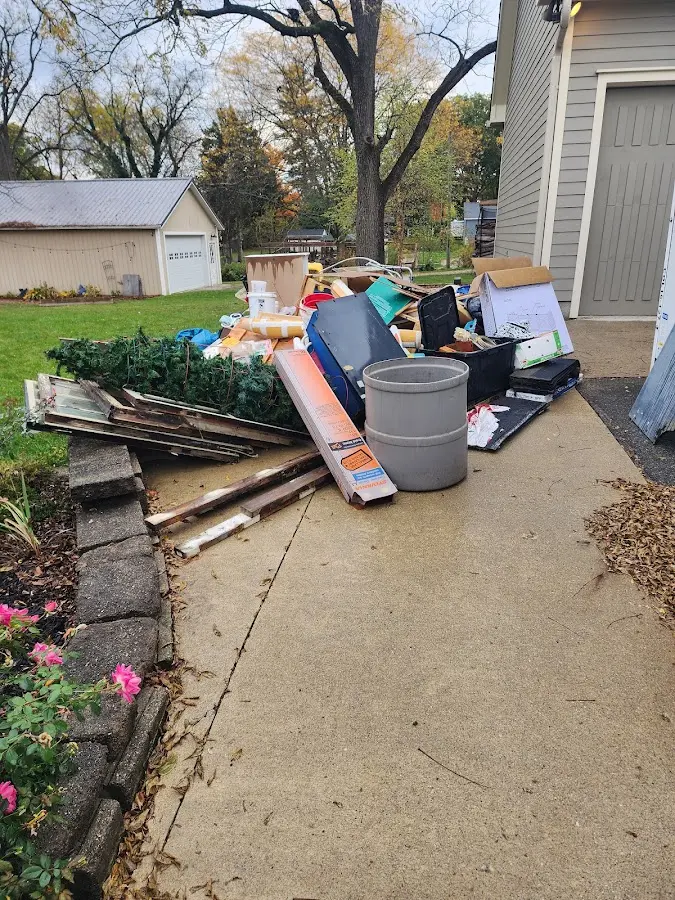 Dumpster being loaded with debris for 30 Yard Dumpster Rental in Conshohocken